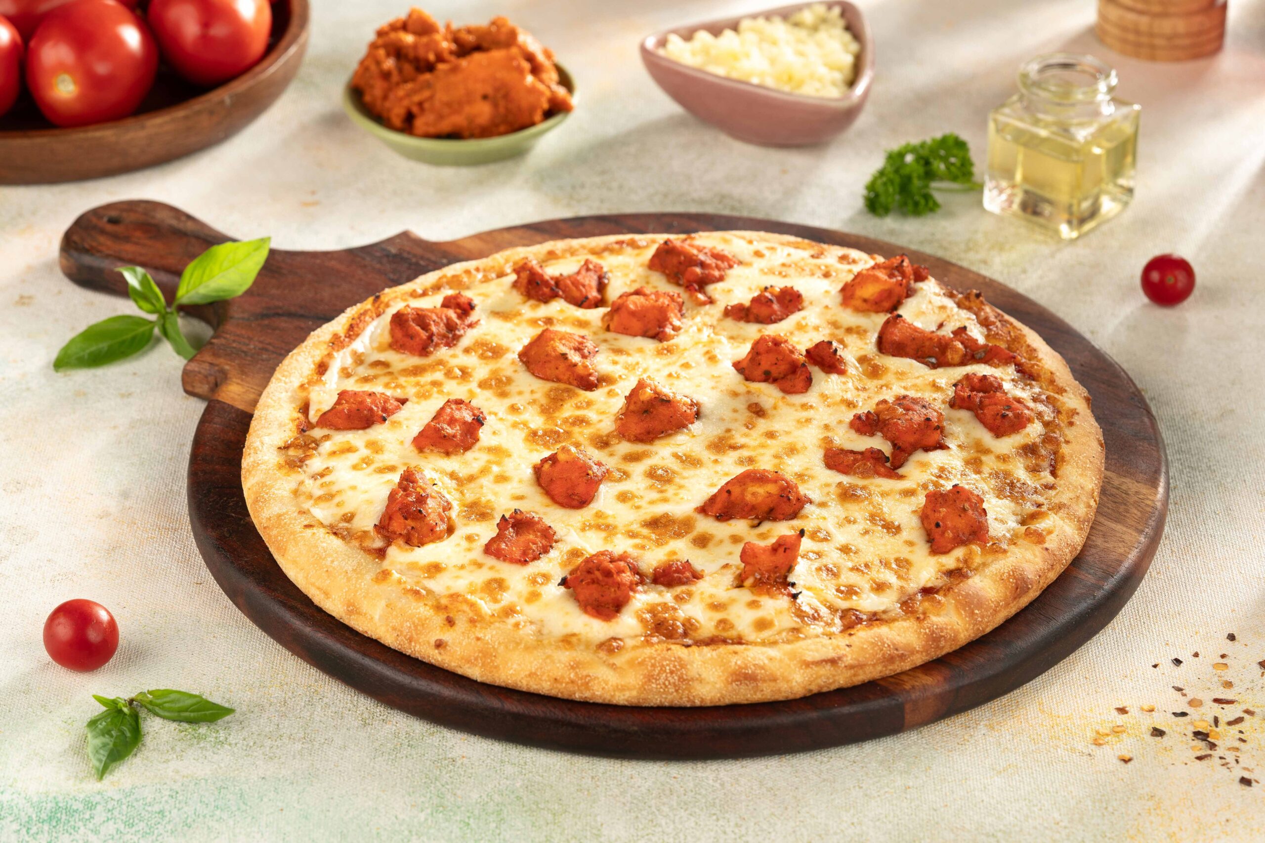 chicken toping pizza